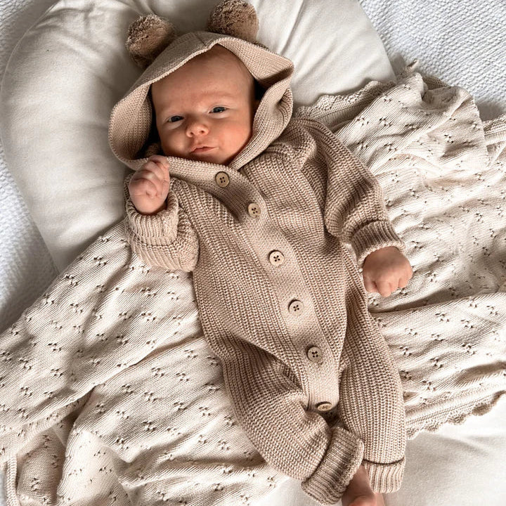 Jolie combinaison à capuche à manches longues pour bébé de couleur unie