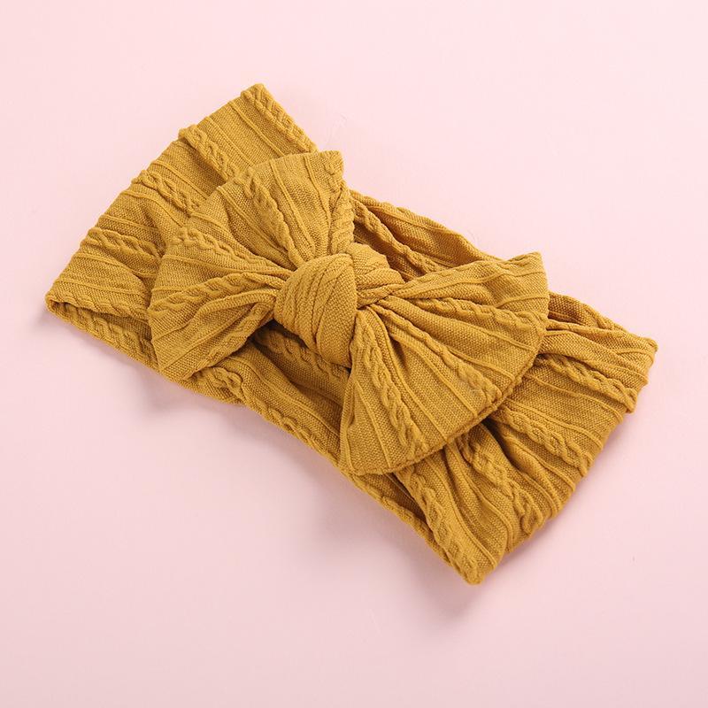 Tiara com decoração de laço para bebê menina