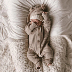 Jolie combinaison à capuche à manches longues pour bébé de couleur unie