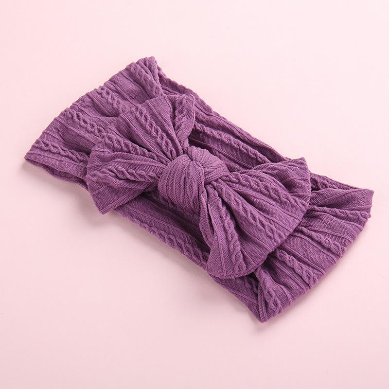Tiara com decoração de laço para bebê menina
