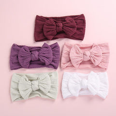 Tiara com decoração de laço para bebê menina