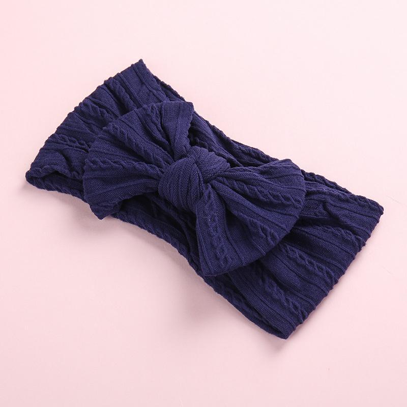 Tiara com decoração de laço para bebê menina