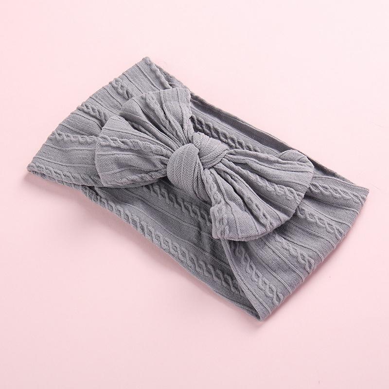 Tiara com decoração de laço para bebê menina