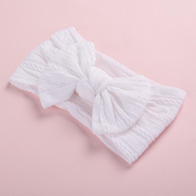 Tiara com decoração de laço para bebê menina
