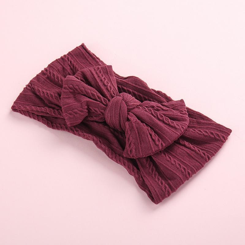 Tiara com decoração de laço para bebê menina