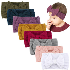 Tiara com decoração de laço para bebê menina